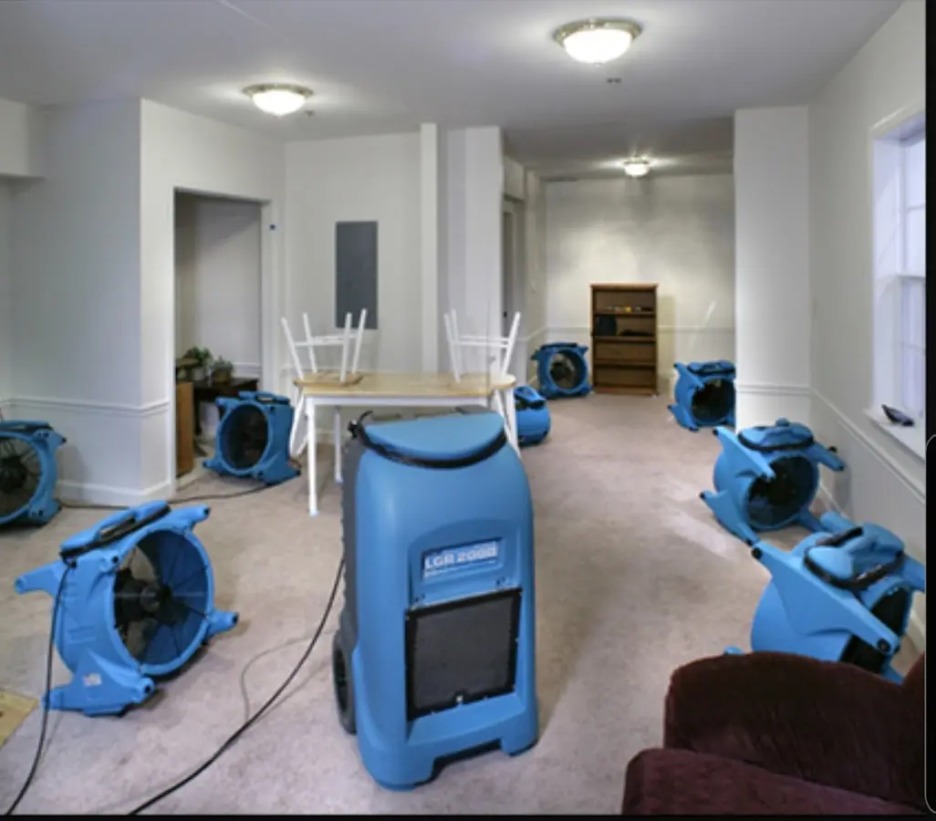 Air movers and dehumidifier setup for Water Damage Restoration in Pomfret